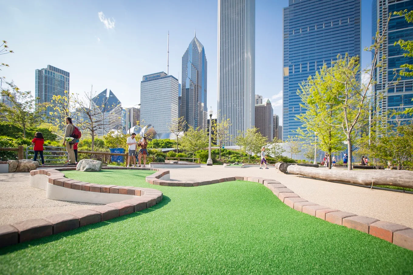 Panoramic Chicago skyline behind City Mini Golf